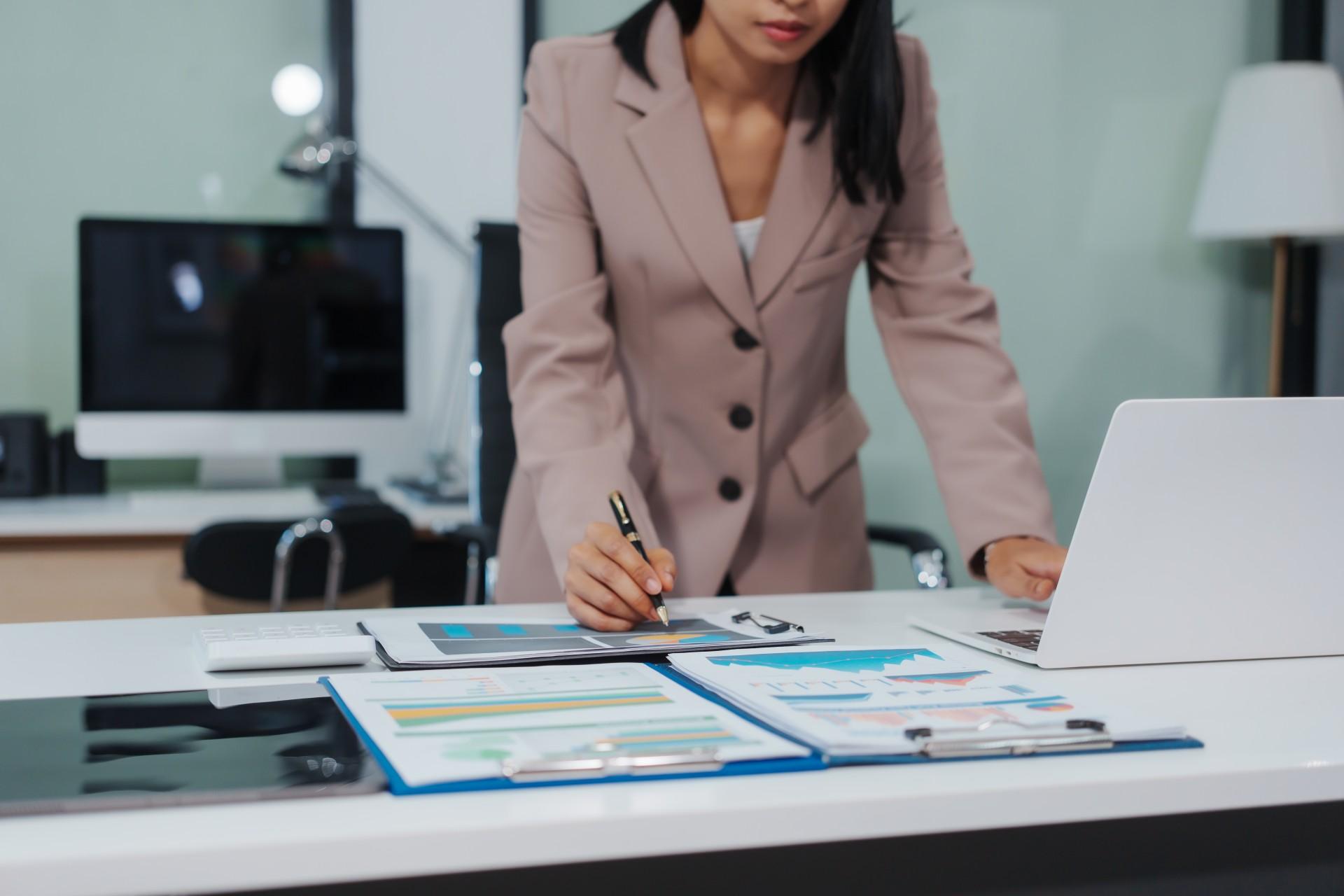 An Asian businesswoman accountant carefully planning